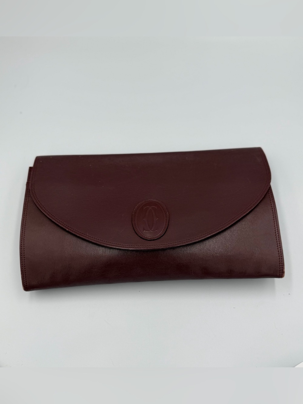 Pre Owned Carter's Leather Clutch in Burgundy with Gold Plate Cartier. With COA